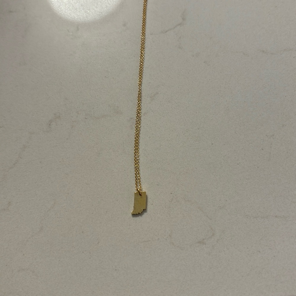 Brand new gold necklace with state of Indiana charm and 18” chain